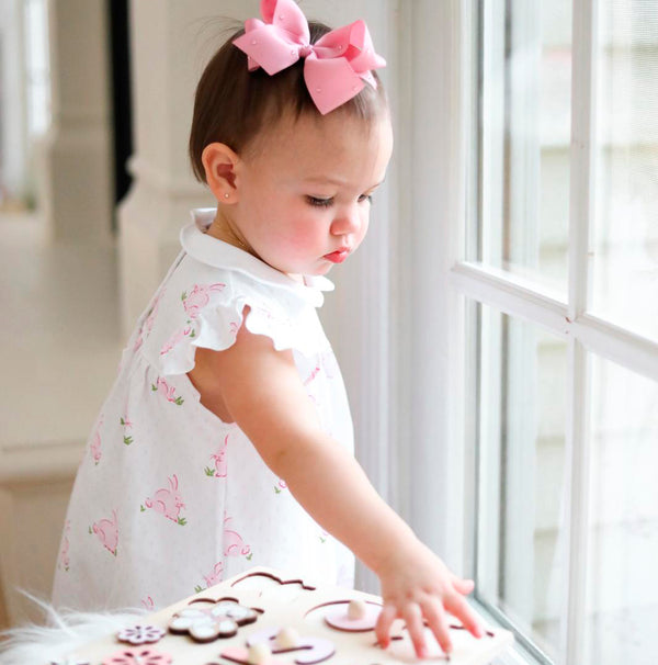 An adorable baby having peruvian pima cotton clothes